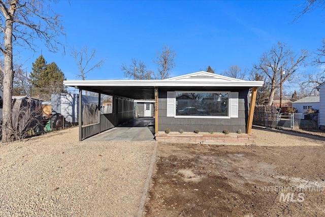 manufactured / mobile home featuring a carport