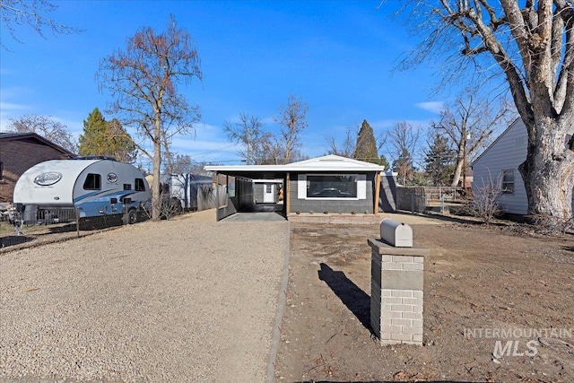 view of front of house with a carport