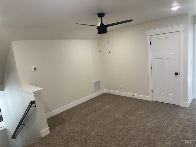 497 Jesse Ave, Twin Falls, ID 83301 - unfurnished room with ceiling fan, dark colored carpet, and baseboards