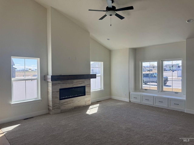 497 Jesse Ave, Twin Falls, ID 83301 - unfurnished living room with a fireplace, carpet flooring, a ceiling fan, and high vaulted ceiling