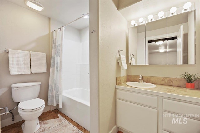 891 N Pointe Dr, Twin Falls, ID 83301 - bathroom featuring toilet, vanity, shower / bathtub combination with curtain, and tile patterned flooring
