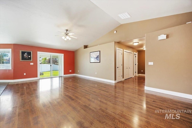 891 N Pointe Dr, Twin Falls, ID 83301 - unfurnished living room with vaulted ceiling, ceiling fan, wood finished floors, and baseboards