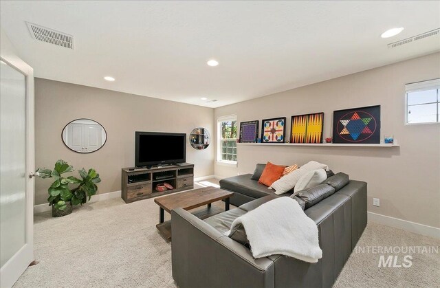 448 E Eaglewoods Ln, Eagle, ID 83616 - carpeted living room with baseboards, recessed lighting, and healthy amount of natural light