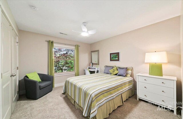 448 E Eaglewoods Ln, Eagle, ID 83616 - bedroom featuring light colored carpet, baseboards, and ceiling fan