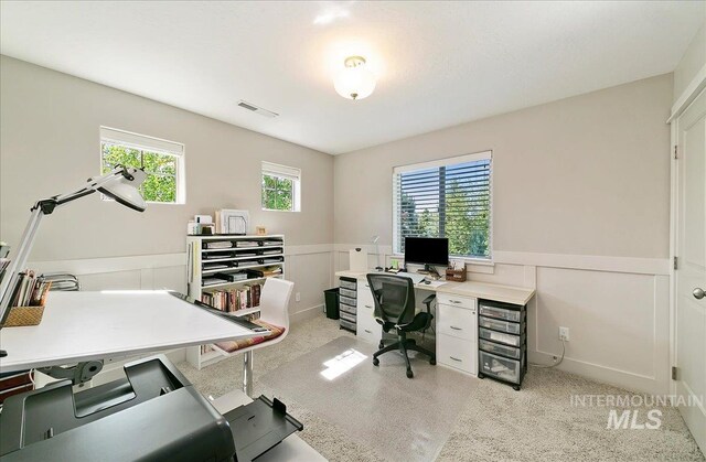 448 E Eaglewoods Ln, Eagle, ID 83616 - office featuring wainscoting, light colored carpet, and a decorative wall