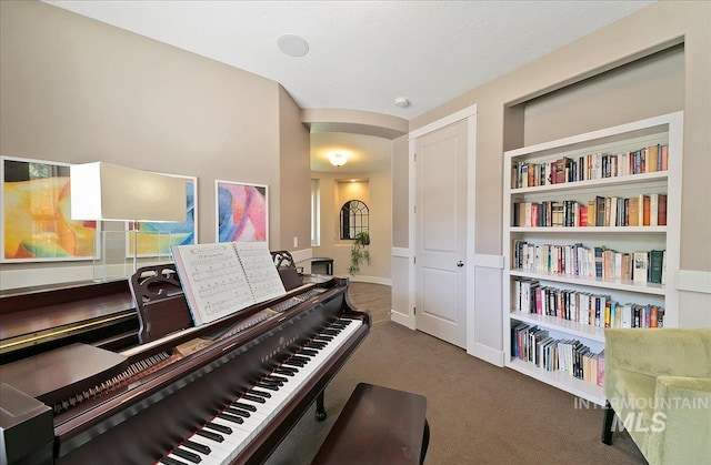 448 E Eaglewoods Ln, Eagle, ID 83616 - sitting room with arched walkways and carpet