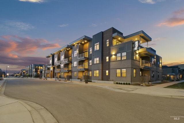 view of property at dusk