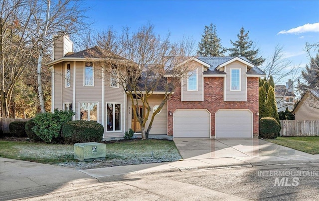 view of front of property with a garage