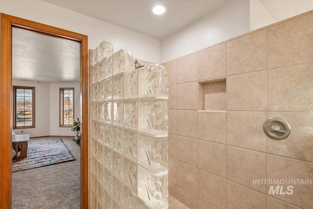 bathroom featuring walk in shower