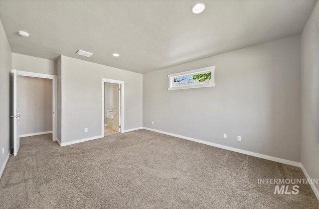 3225 N Quarrystone Way, Meridian, ID 83646 - unfurnished bedroom with carpet floors, baseboards, recessed lighting, and ensuite bath