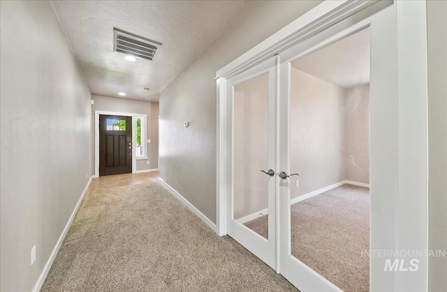 3225 N Quarrystone Way, Meridian, ID 83646 - hall with carpet floors, baseboards, and french doors