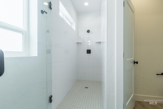 bathroom featuring a stall shower