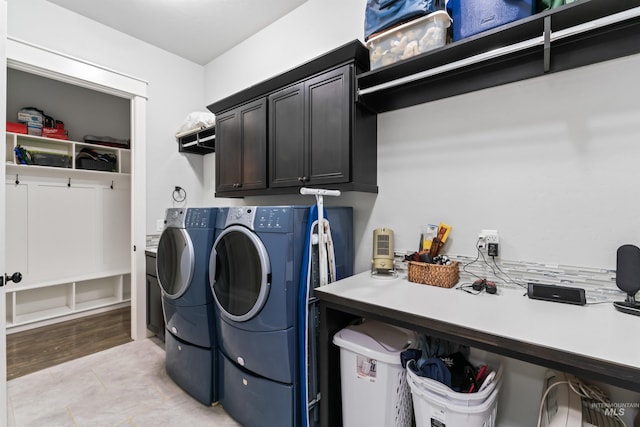 2133 N Star Garnet Ave, Kuna, ID 83634 - washroom with washing machine and dryer and cabinet space