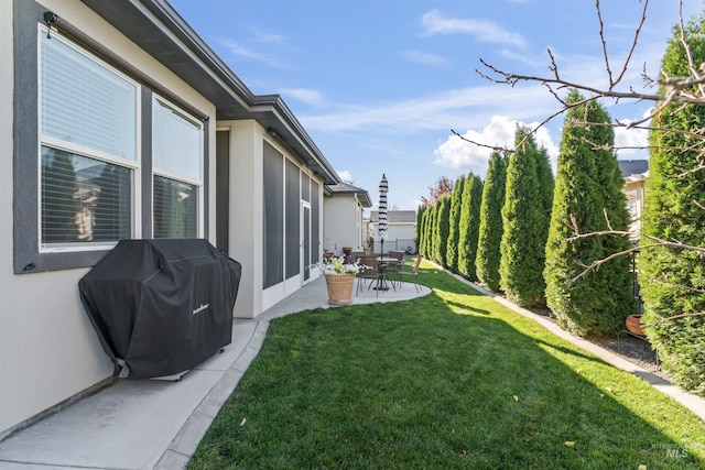 2133 N Star Garnet Ave, Kuna, ID 83634 - view of green lawn with a patio