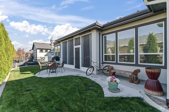 2133 N Star Garnet Ave, Kuna, ID 83634 - rear view of house with a patio area and stucco siding
