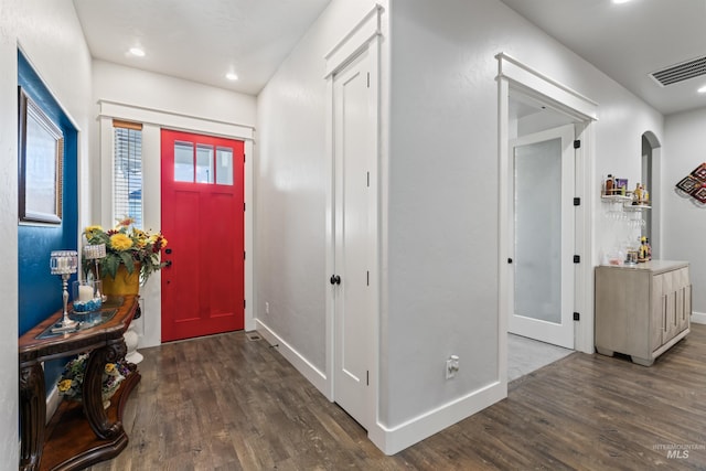 2133 N Star Garnet Ave, Kuna, ID 83634 - entrance foyer featuring wood finished floors, baseboards, recessed lighting, and arched walkways