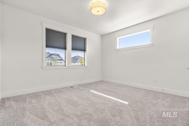 1279 W Ultar, Nampa, ID 83686 - carpeted empty room featuring baseboards and visible vents