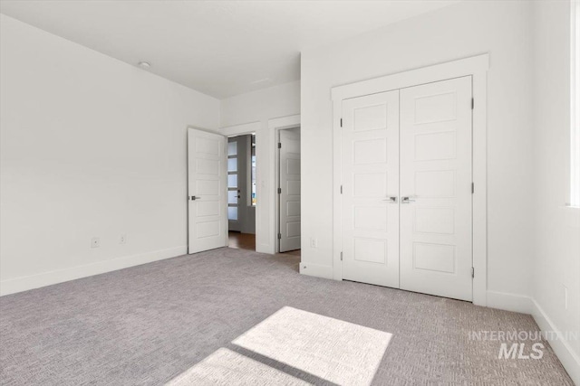 1279 W Ultar, Nampa, ID 83686 - unfurnished bedroom with a closet, carpet flooring, and baseboards