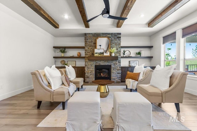 1279 W Ultar, Nampa, ID 83686 - living area featuring baseboards, a ceiling fan, beam ceiling, and wood finished floors