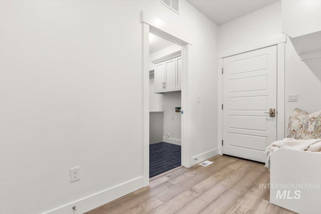 1279 W Ultar, Nampa, ID 83686 - bedroom with visible vents, light wood finished floors, and baseboards