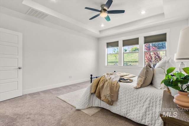 1279 W Ultar, Nampa, ID 83686 - carpeted bedroom with visible vents, baseboards, recessed lighting, a tray ceiling, and a ceiling fan