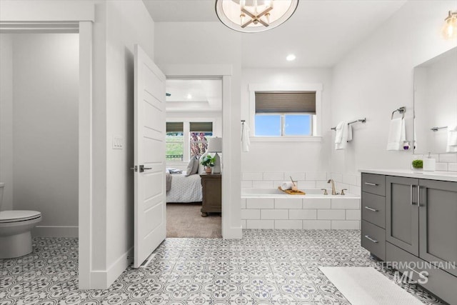 1279 W Ultar, Nampa, ID 83686 - ensuite bathroom with a garden tub, vanity, tile patterned floors, toilet, and connected bathroom