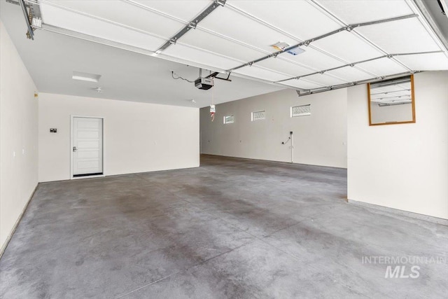 1279 W Ultar, Nampa, ID 83686 - garage featuring a garage door opener