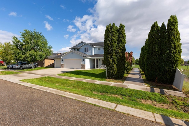 11422 W Darkwood St, Star, ID 83669 - view of front of property with driveway, an attached garage, and a front lawn