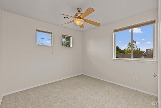 11422 W Darkwood St, Star, ID 83669 - spare room with carpet, baseboards, and a ceiling fan