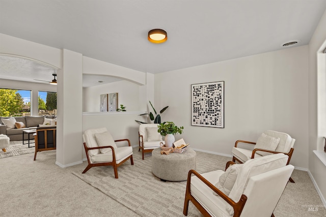 11422 W Darkwood St, Star, ID 83669 - living area featuring carpet floors, a ceiling fan, and baseboards
