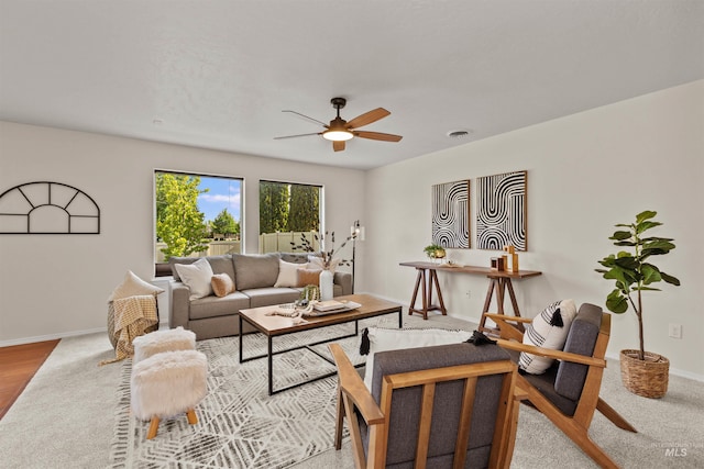 11422 W Darkwood St, Star, ID 83669 - living area featuring a ceiling fan and baseboards