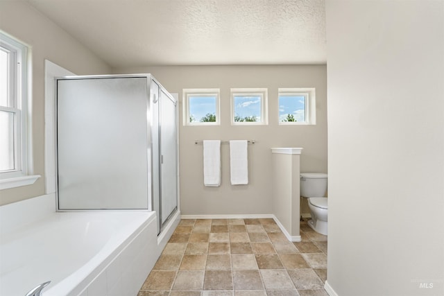 5217 Weston Ave, Caldwell, ID 83607 - bathroom with a bath, a shower stall, and stone finish flooring