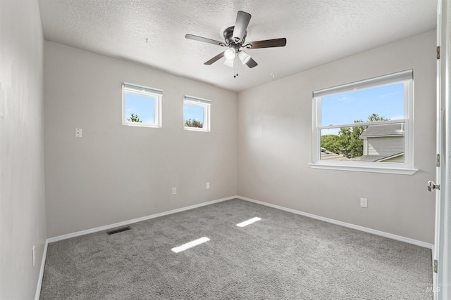 5217 Weston Ave, Caldwell, ID 83607 - spare room with a textured ceiling, carpet, and ceiling fan