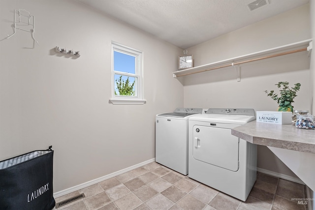 5217 Weston Ave, Caldwell, ID 83607 - laundry room featuring washer and clothes dryer and baseboards