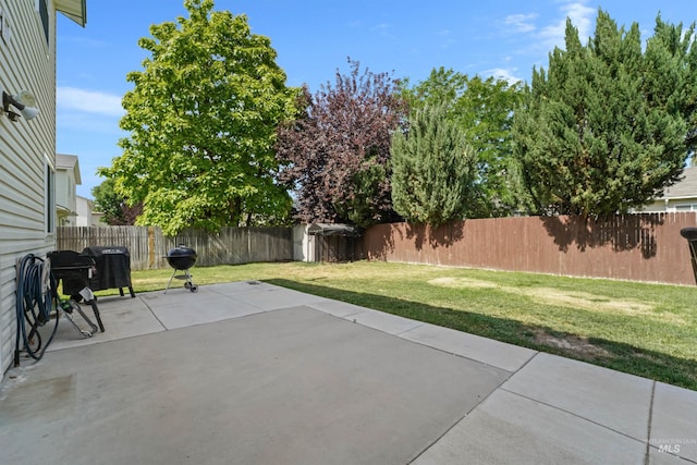 5217 Weston Ave, Caldwell, ID 83607 - fenced backyard with a patio area