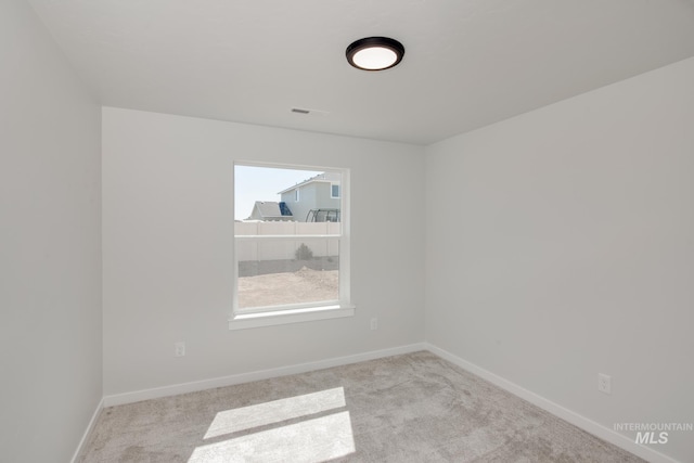 8172 E Red Horse St, Nampa, ID 83687 - carpeted spare room featuring healthy amount of natural light and baseboards