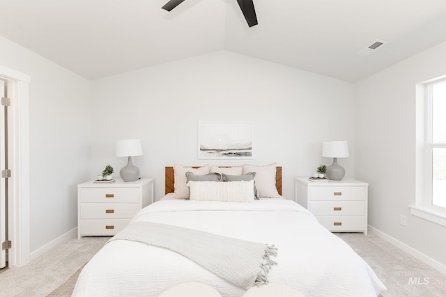 8172 E Red Horse St, Nampa, ID 83687 - bedroom with light carpet, baseboards, vaulted ceiling, and ceiling fan