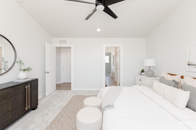8172 E Red Horse St, Nampa, ID 83687 - bedroom with light colored carpet, baseboards, a ceiling fan, and recessed lighting
