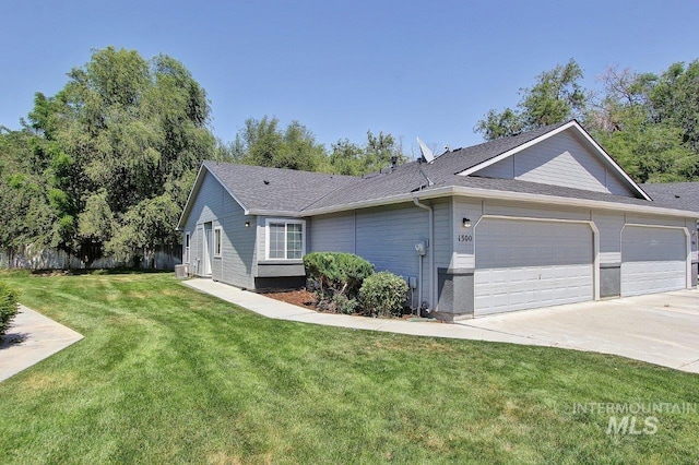 1300 Diamond Ct, Nampa, ID 83686 - view of property exterior with a garage, a yard, concrete driveway, and roof with shingles