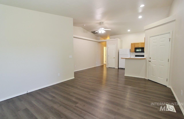 1300 Diamond Ct, Nampa, ID 83686 - unfurnished living room featuring recessed lighting, dark wood-style flooring, a ceiling fan, vaulted ceiling, and baseboards