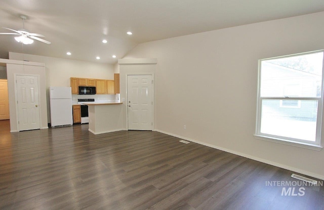 1300 Diamond Ct, Nampa, ID 83686 - unfurnished living room featuring a ceiling fan, dark wood finished floors, baseboards, recessed lighting, and vaulted ceiling