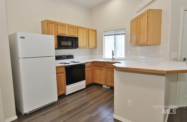 1300 Diamond Ct, Nampa, ID 83686 - kitchen with freestanding refrigerator, black microwave, electric range oven, a peninsula, and a sink