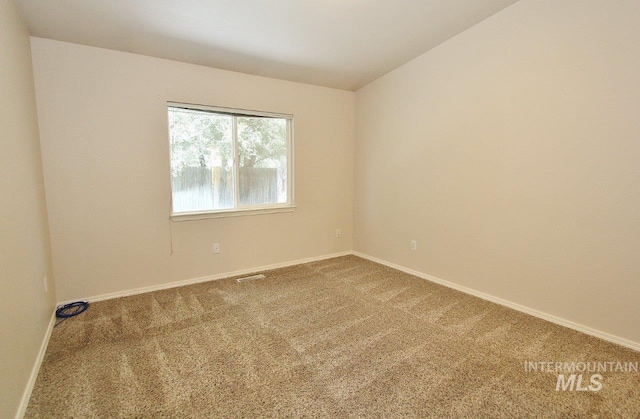 1300 Diamond Ct, Nampa, ID 83686 - carpeted spare room with baseboards