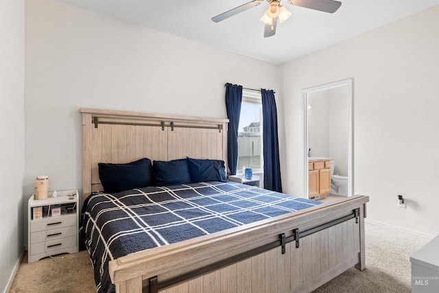 1597 Vista Dr, Twin Falls, ID 83301 - bedroom featuring carpet floors, baseboards, ensuite bathroom, and ceiling fan
