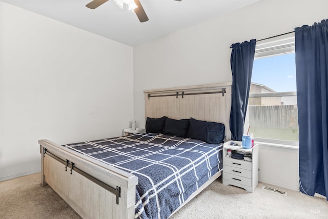 1597 Vista Dr, Twin Falls, ID 83301 - bedroom featuring carpet floors, ceiling fan, and visible vents