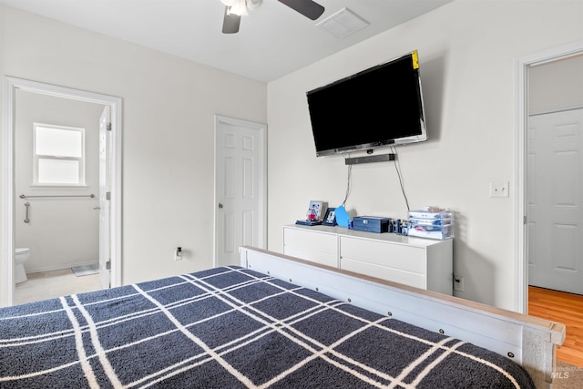 1597 Vista Dr, Twin Falls, ID 83301 - bedroom featuring visible vents, ceiling fan, and ensuite bath