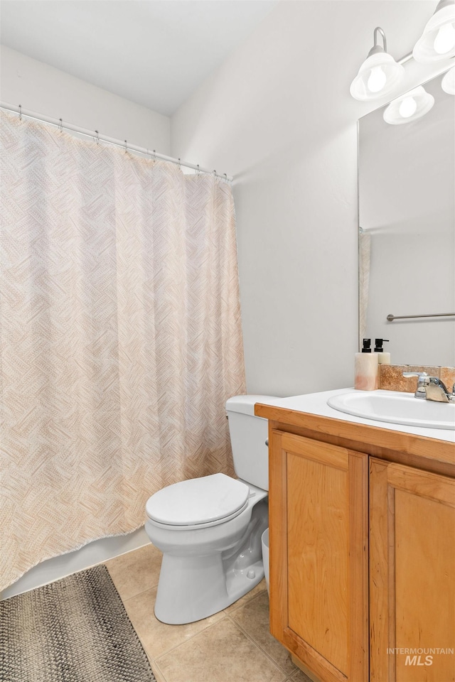 1597 Vista Dr, Twin Falls, ID 83301 - bathroom featuring toilet, tile patterned floors, shower / bath combo, and vanity