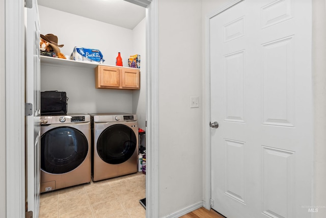1597 Vista Dr, Twin Falls, ID 83301 - washroom with baseboards, cabinet space, and washer and dryer