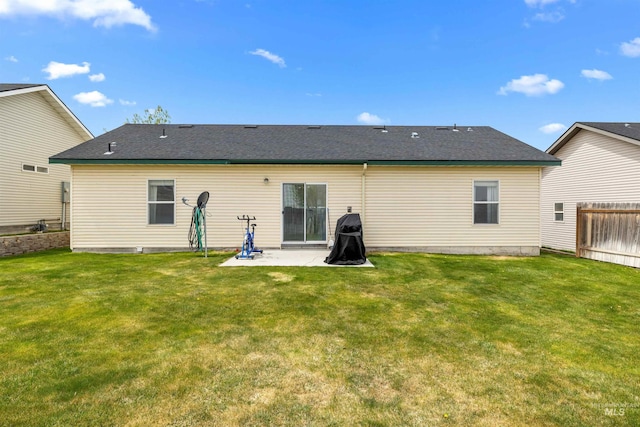 1597 Vista Dr, Twin Falls, ID 83301 - rear view of property with fence, a lawn, and a patio area