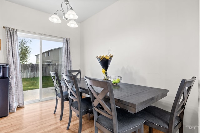 1597 Vista Dr, Twin Falls, ID 83301 - dining room featuring an inviting chandelier and light wood-style floors